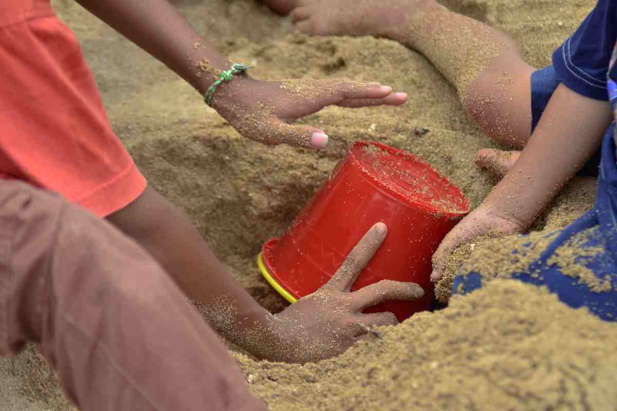 sabbia mare bambini infezioni